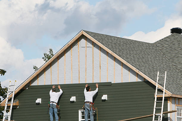 Professional Siding Contractor technician working in Springboro, PA